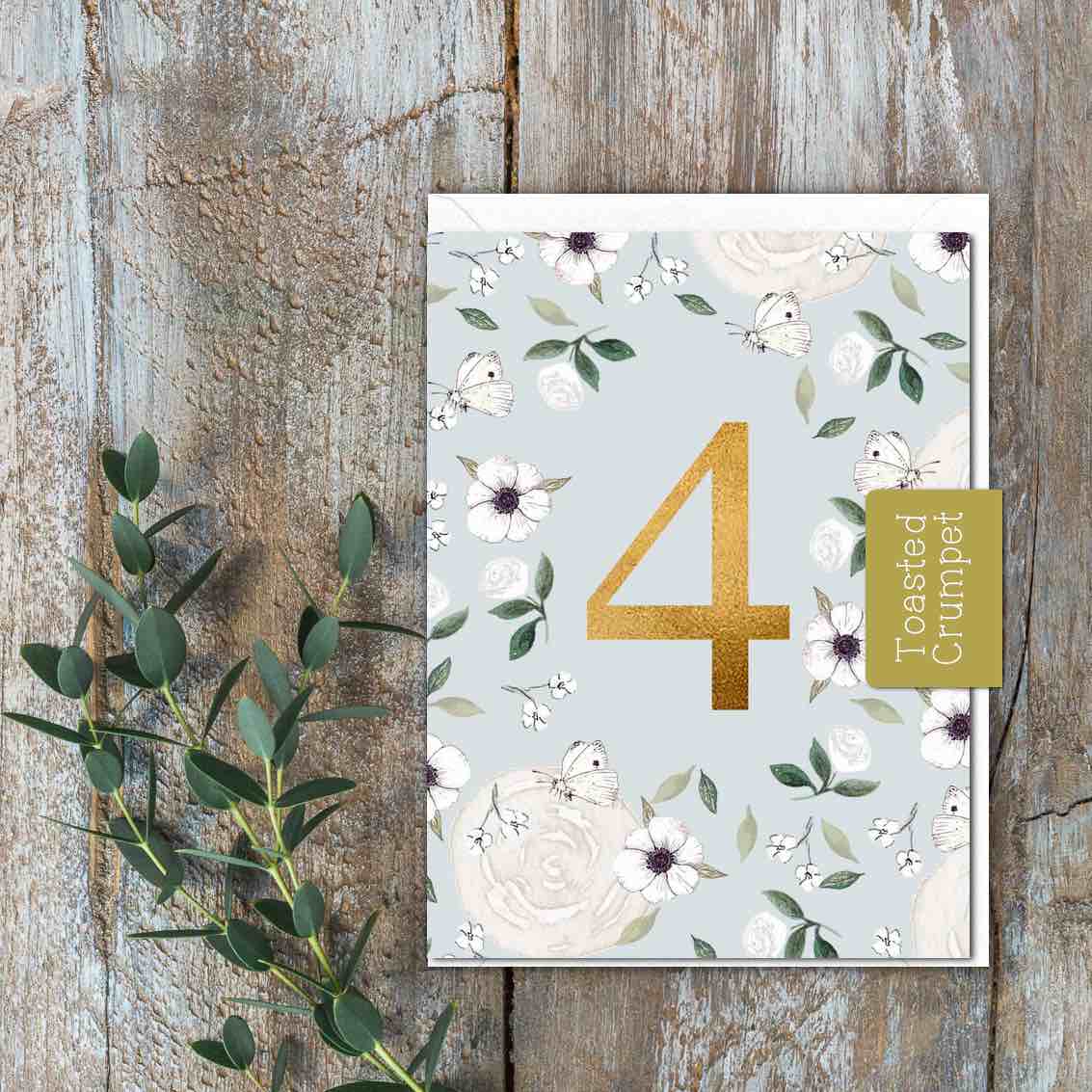 "Four" Birthday Milestone (White Butterflies & Flowers on Blue) Card (Cello-Free)