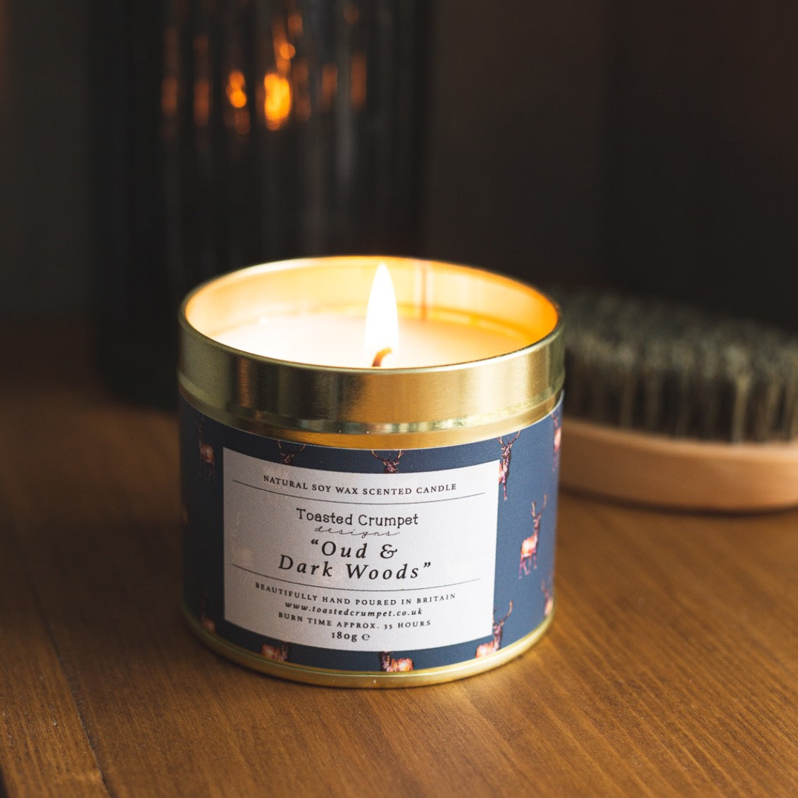 Dark Woods & Oud Candle in a Matt Gold Tin